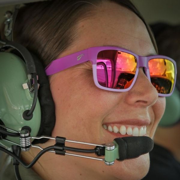 Flying Eyes Optics On AvPay pilot with pink glasses