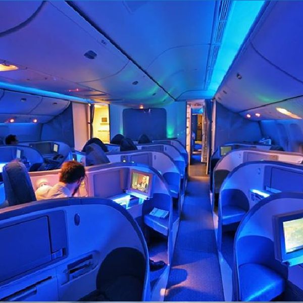 Global Charters On AvPay cabin at night with neon lights