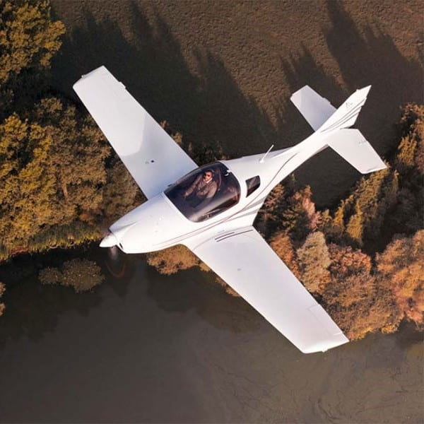 JMB Aircraft VL3 912 Ultralight Aircraft For Sale in flight over trees
