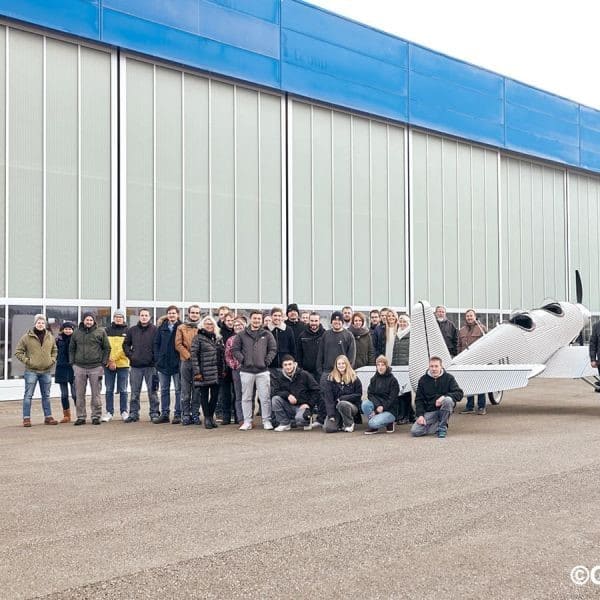 Kasaero team with finished airplane outside hanger