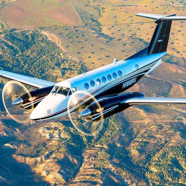 Kull Jet on AvPay flying over countryside
