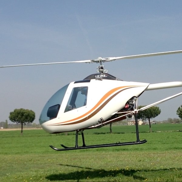 Lamanna Helicopter. White helicopter lifting-off-min