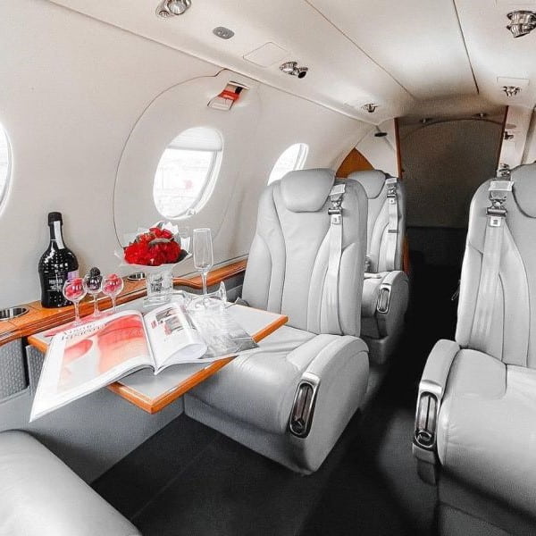 Lunajets Private Jet Interior with Champagne-min