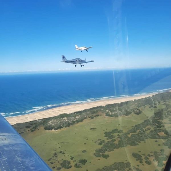 Madiba Bay School of Flight Gallery Sling aircrafy flying in formation