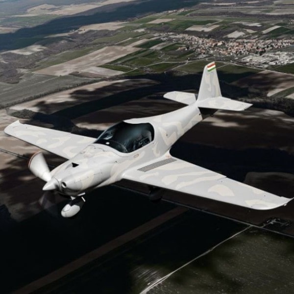 Magnus Aircraft Fusion Sentinel in flight over countryside