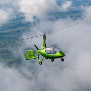 New AutoGyro Calidus Gyrocopter Aircraft For Sale By AutoGyro Deutschland in flight through clouds