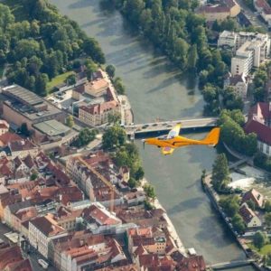 New Elektra One Solar Electric Aircraft For Sale in flight over town