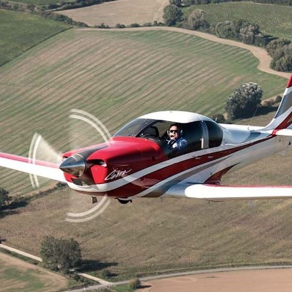 New Evektor Super Cobra Ultralight Aircraft For Sale in flight over countryside