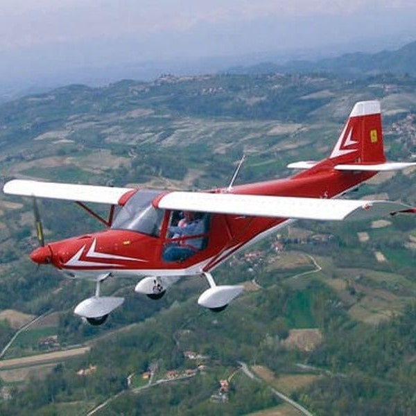 New ICP Aviazione Savannah S Ultralight Aircraft For Sale in flight over countryside