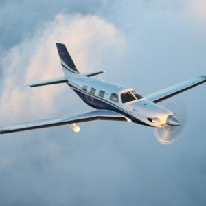 New Piper M500 Turboprop Aircraft For Sale in flight through clouds