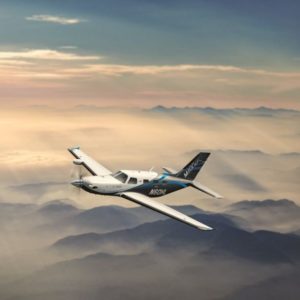 New Piper M600 SLS Turboprop Aircraft For Sale in flight through misty mountains