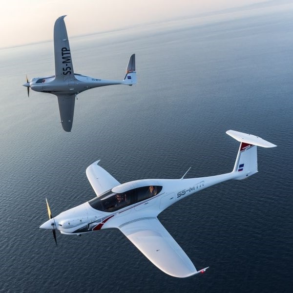 New Pipistrel Panthera Microlight Aircraft For Sale two planes in flight over water