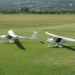 New Pipistrel Sinus 912 Motorised Glider For Sale two gliders landed in field