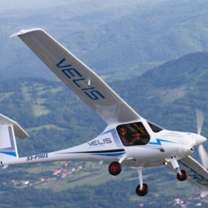 New Pipistrel Velis Electro Electric Aircraft For Sale in flight right wing over trees