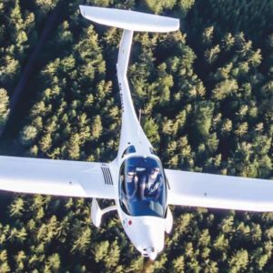 New Pure Flight U15 Phoenix (Petrol Version) Motor Glider For Sale in flight over trees