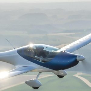 New Pure Flight U15E Onix Motor Glider For Sale in flight over countryside