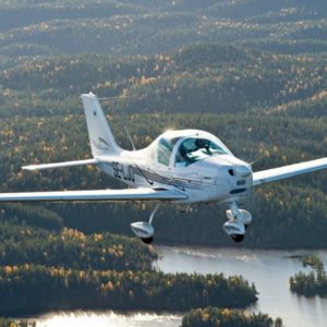 New Tecnam P2002 JF Single Engine Piston Aircraft For Sale flying over forrest and rivers