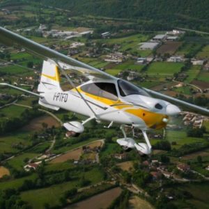 New Tecnam P2010 170 Jet A1 Single Engine Piston Aircraft For Sale in flight over countryside