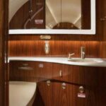 Off Market Gulfstream G200 Private Jet for sale on AvPay. Washroom
