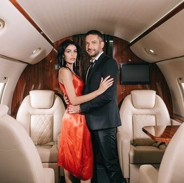 Pristine Jet Charter couple in the back of a private jet-min