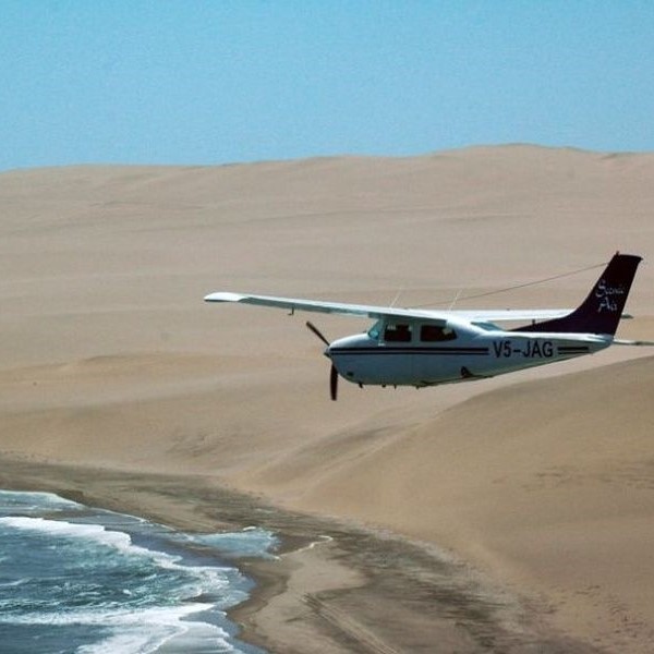Scenic Air Namibia in the air coming to water
