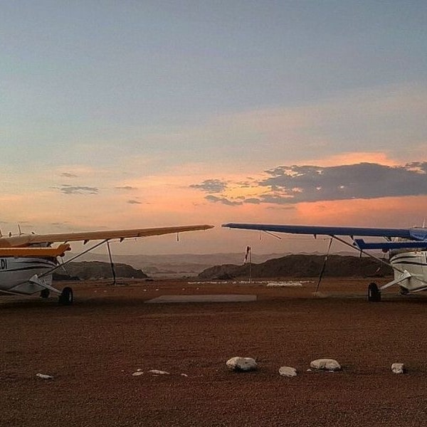 Scenic Air Namibia two planes at sunset