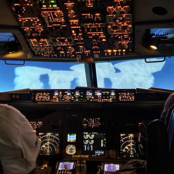 SimAir 737 Boeing 737 Flight Simulator view of towering cumulus clouds-min