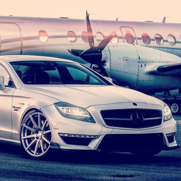 Symphony Private Jets Mercedes parked in front of Saab 341
