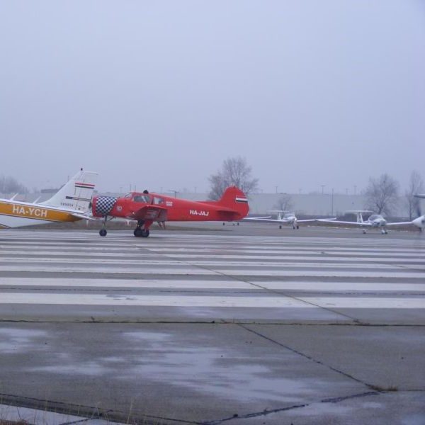 Tököl Airport Seneca and Yak waiting on the runway threshhold