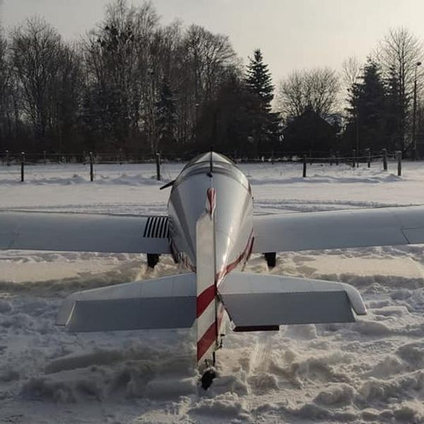 Velocity Aviation plane in snow tail