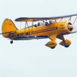 Waco Air Museum aircraft climbing