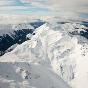 World In A Day Scenic Flight From Christchurch Helicopters on AvPay land on snow topped mountains